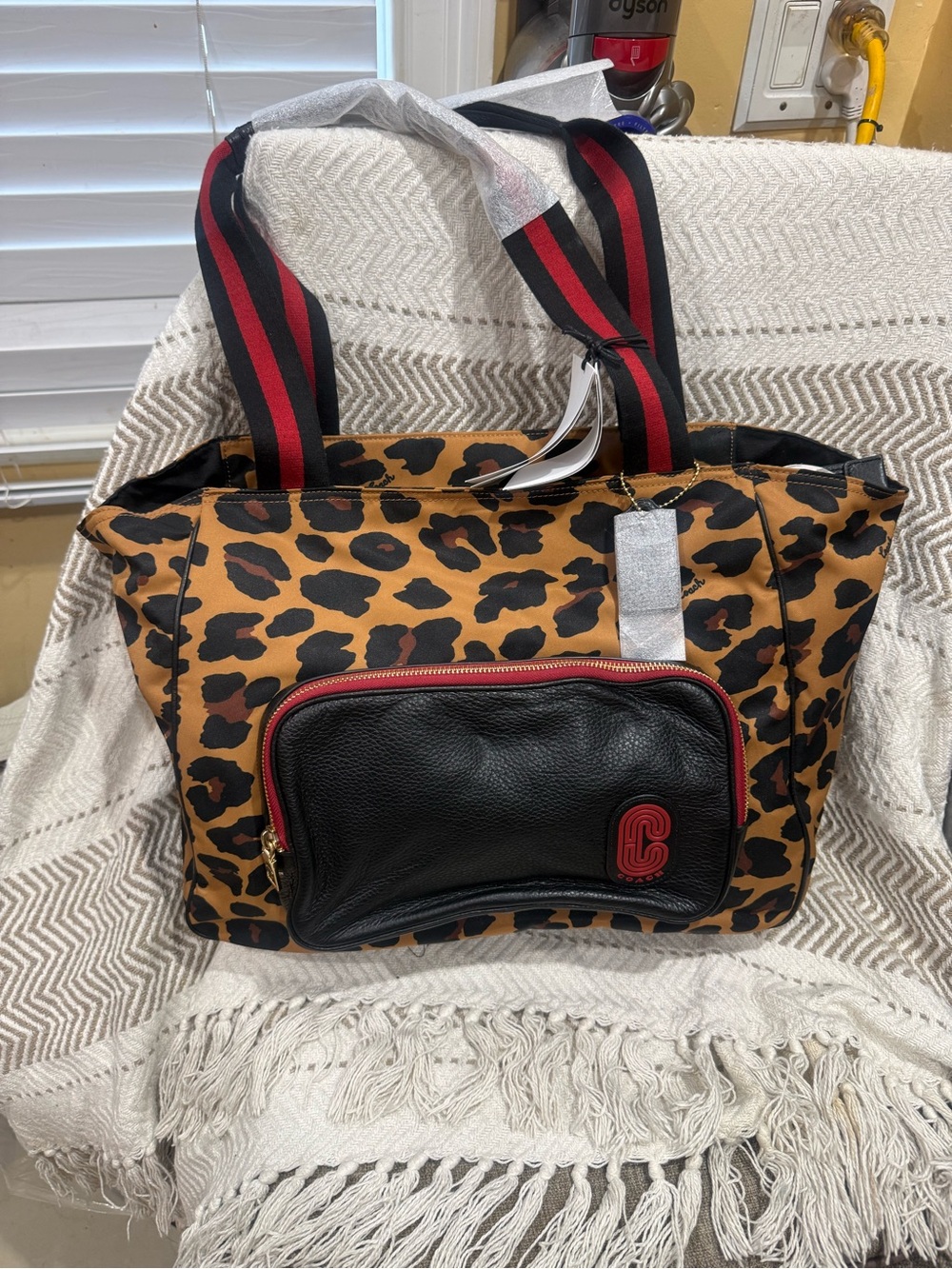Leopard Print Tote Bag with Black Front Pocket and Red-Trim Accents